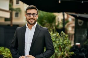 Confident, smiling man in business attire